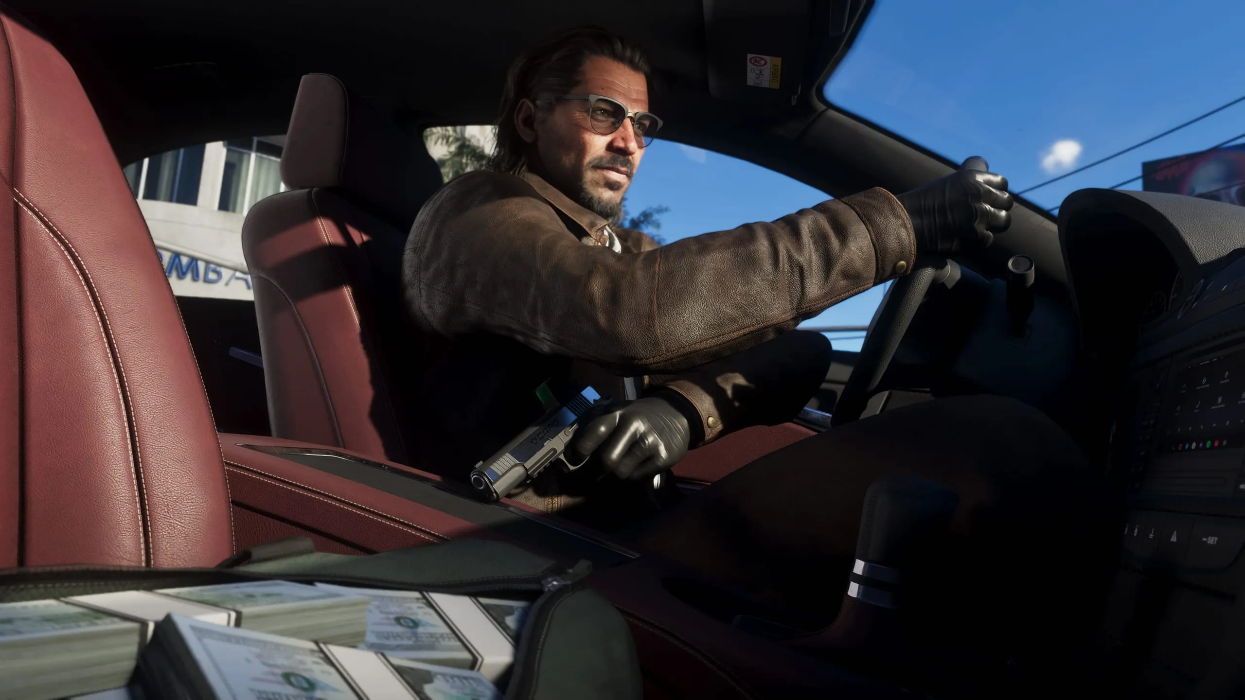 Gloved driver holds a pistol at the wheel, cash bundles spilling from an open bag