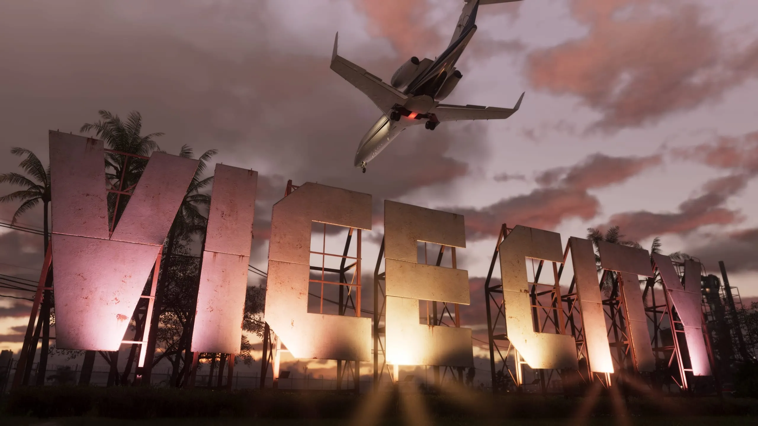 Giant Vice City letter signs glowing at dusk as a private jet skims overhead